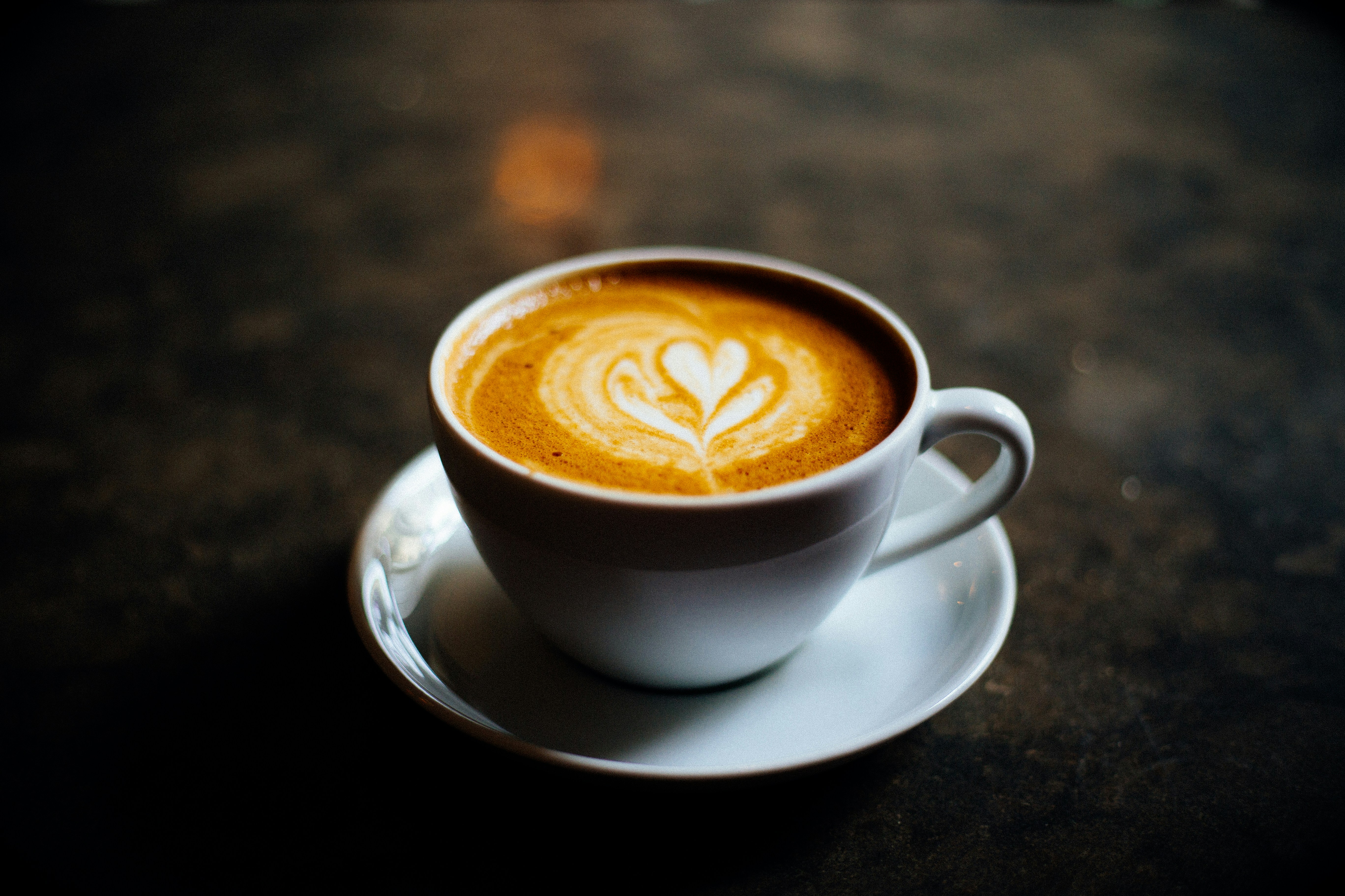 Latte art and fresh bakes on the counter