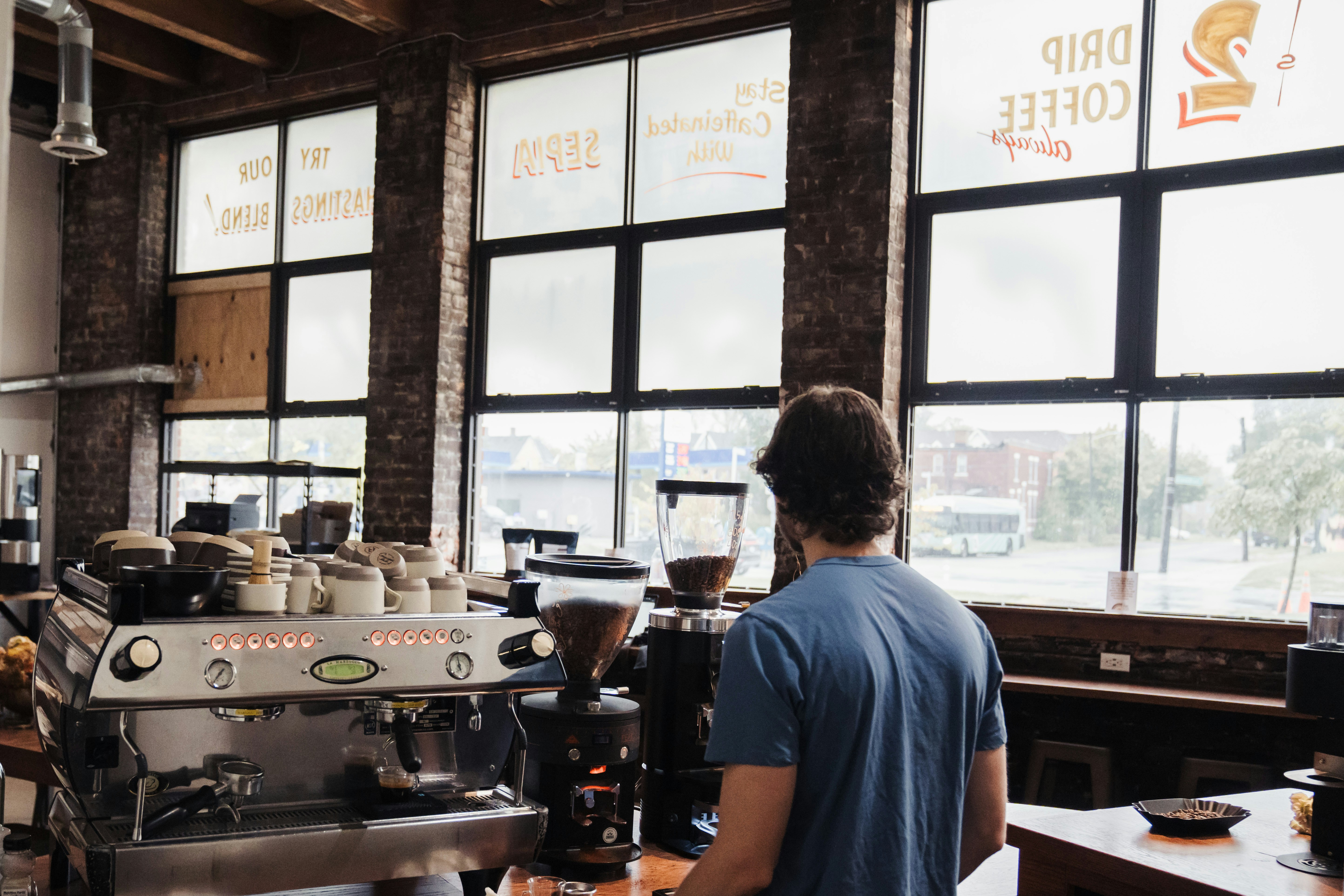Inside the café — small tables and the window seat